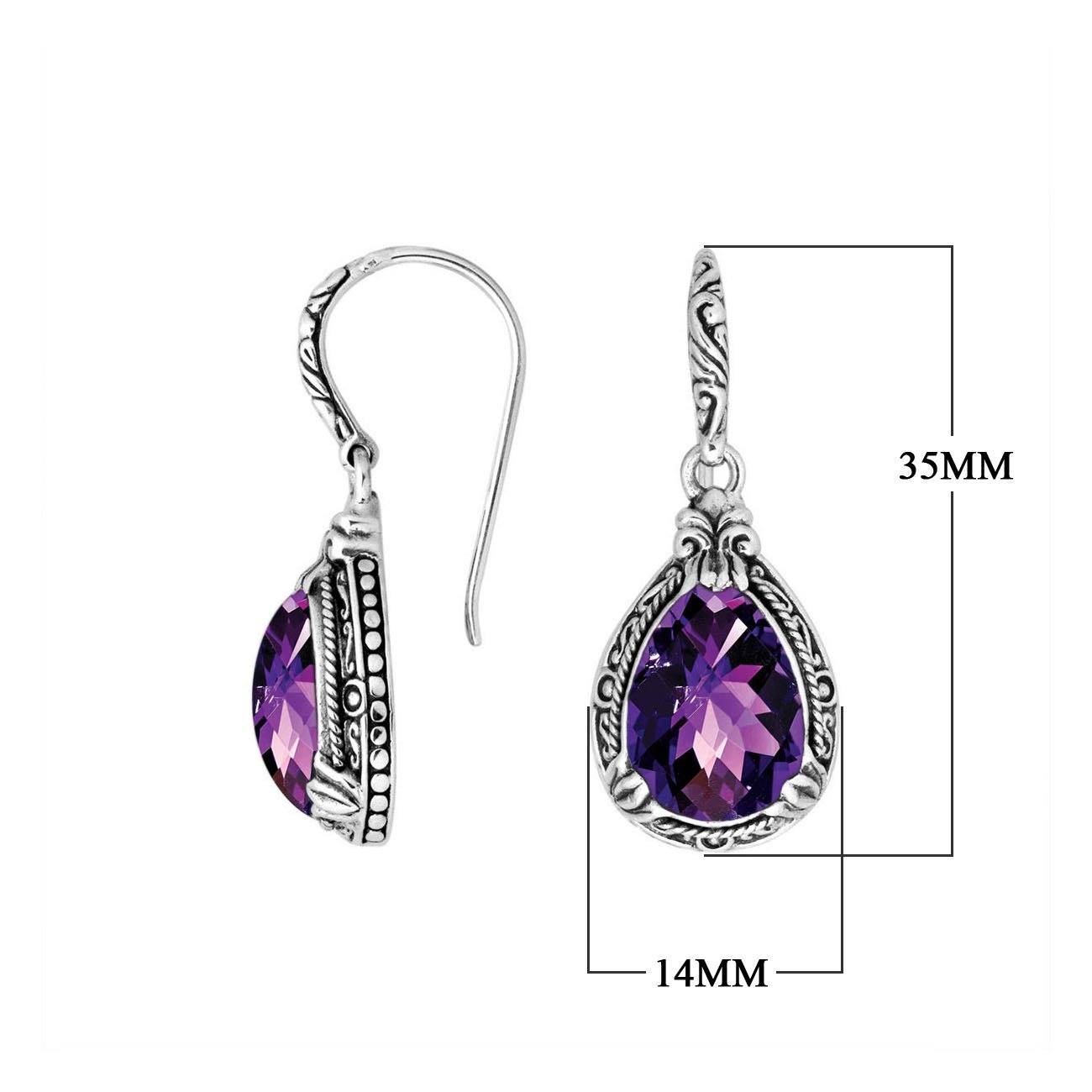 Sterling silver pear-shaped Amethyst Quartz earrings with ornate Balinese detailing and earwire lock, featuring a high-gloss polished finish for wholesale jewelry distributors and catalogs.