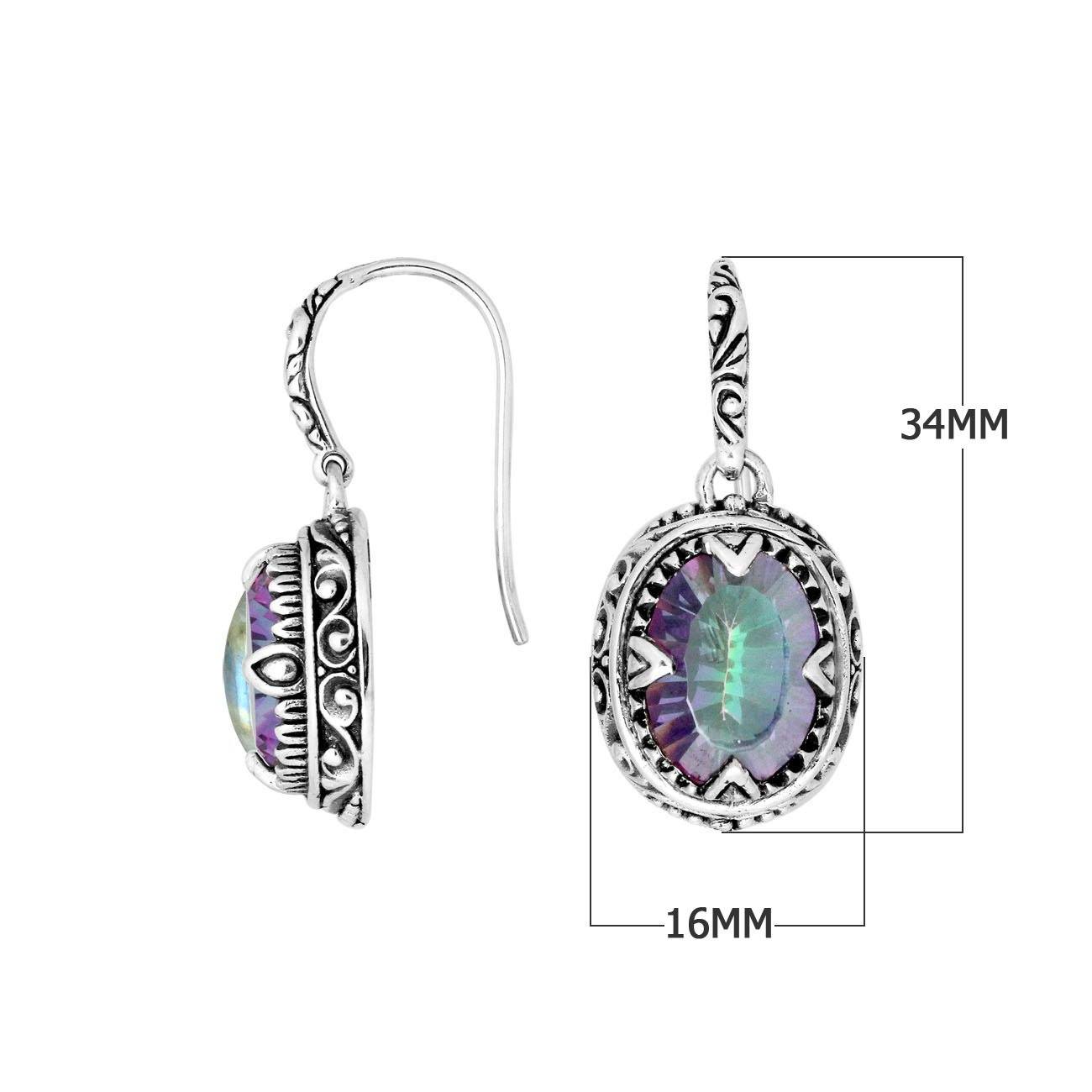 Sterling silver oval drop earrings with Mystic Quartz and ornate oxidized silver detailing for wholesale collections.