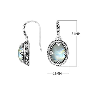 Sterling silver oval drop earrings with Rainbow Moonstone and decorative oxidized silver detailing for wholesale collections.