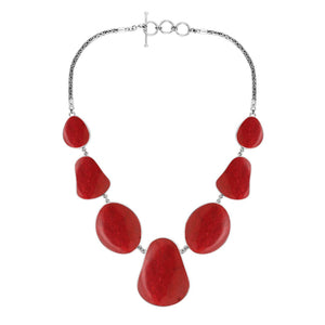 Wholesale sterling silver teardrop coral necklace with Balinese handcrafted design.