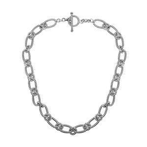 Sterling silver textured rope link chain necklace with toggle clasp.