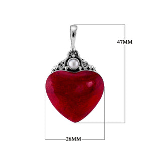 Sterling silver heart pendant with bold red coral centerpiece and round Mother of Pearl accent, handcrafted Bali jewelry available for wholesale purchase.