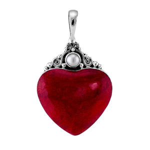 Sterling silver heart pendant with bold red coral centerpiece and round Mother of Pearl accent, handcrafted Bali jewelry available for wholesale purchase.