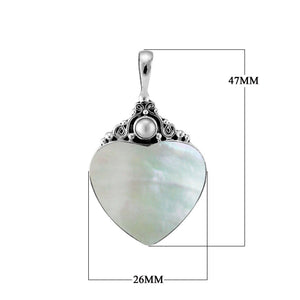 Sterling silver heart pendant with luminous Mother of Pearl centerpiece and artisan scrollwork, handcrafted Bali jewelry available for wholesale purchase.