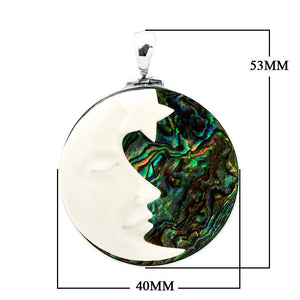 Sterling silver round pendant with carved bone face and abalone shell inlay, handcrafted Bali jewelry available for wholesale purchase.