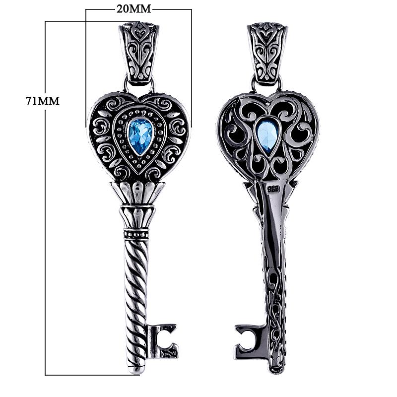 Wholesale sterling silver heart key pendant with genuine blue topaz gemstone and Balinese scrollwork, handcrafted artisan jewelry for bulk orders.