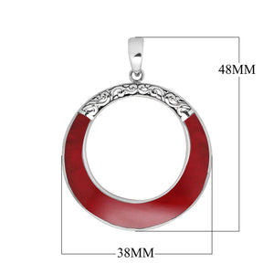 Wholesale sterling silver round pendant with red coral inlay, open circle design, and ornate silver detailing – handcrafted Bali jewelry