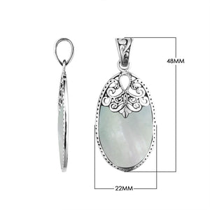 Wholesale sterling silver oval pendant with luminous Mother of Pearl inlay and ornate Balinese filigree detailing, handcrafted in Bali.