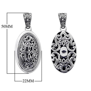 Sterling silver oval pendant with intricate Bali carvings, wholesale artisan jewelry.