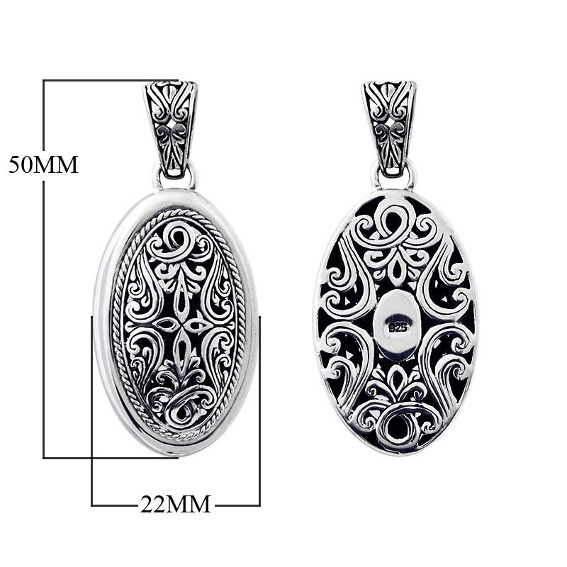 Sterling silver oval pendant with intricate Bali carvings, wholesale artisan jewelry.