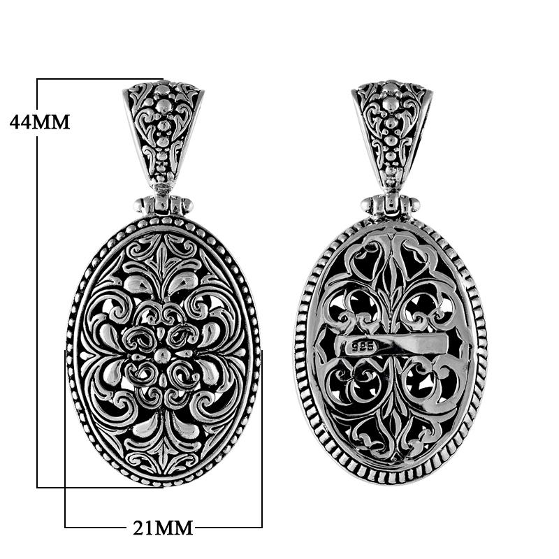 Sterling silver oval pendant with floral scrollwork, handcrafted Bali wholesale jewelry.