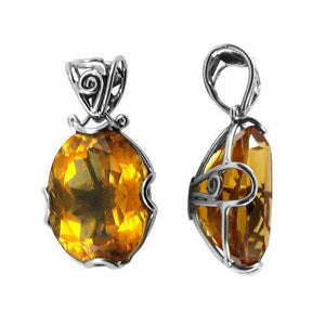 Sterling silver oval pendant with faceted Citrine Quartz and scroll prong setting, handcrafted in Bali