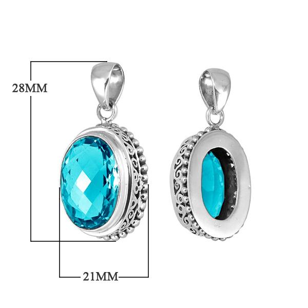 Sterling silver oval pendant with faceted Blue Topaz Quartz and ornate detailing, handcrafted in Bali