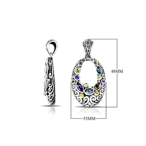 Wholesale sterling silver oval pendant with Amethyst Quartz, Blue Topaz Quartz, Peridot Quartz, and Citrine Quartz in Balinese scroll design, handcrafted in Bali.