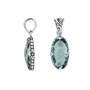 Sterling Silver oval-shaped Blue Topaz Quartz pendant with floral engravings