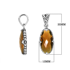 Sterling Silver oval-shaped Citrine Quartz pendant with floral engraved detailing