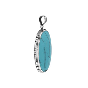 925 sterling silver oval pendant with turquoise shell and hammered silver edge handcrafted in Bali