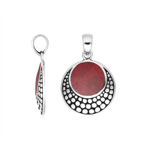 Round sterling silver pendant with red coral and dotted Balinese frame handcrafted in Bali.