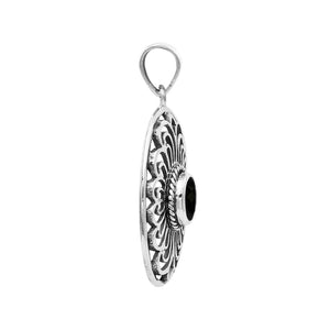 A handcrafted sterling silver pendant featuring a faceted Black Onyx in an elegant oval Balinese filigree frame.