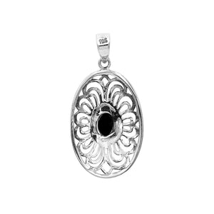 A handcrafted sterling silver pendant featuring a faceted Black Onyx in an elegant oval Balinese filigree frame.