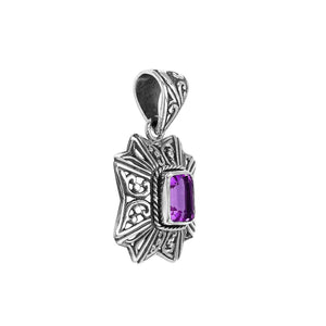 Handcrafted sterling silver rectangular pendant with Amethyst Quartz center and traditional Balinese motif design.