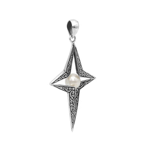 Sterling silver pendant featuring a four-point star design with White Pearl center and detailed filigree craftsmanship.