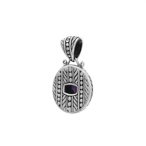 Sterling silver cushion pendant featuring Amethyst Quartz with detailed dome carving and oxidized Balinese silverwork.