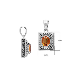 Rectangular sterling silver pendant featuring oval citrine quartz, Balinese swirl engravings, and a smooth mirror-polished finish with elegant detailing.