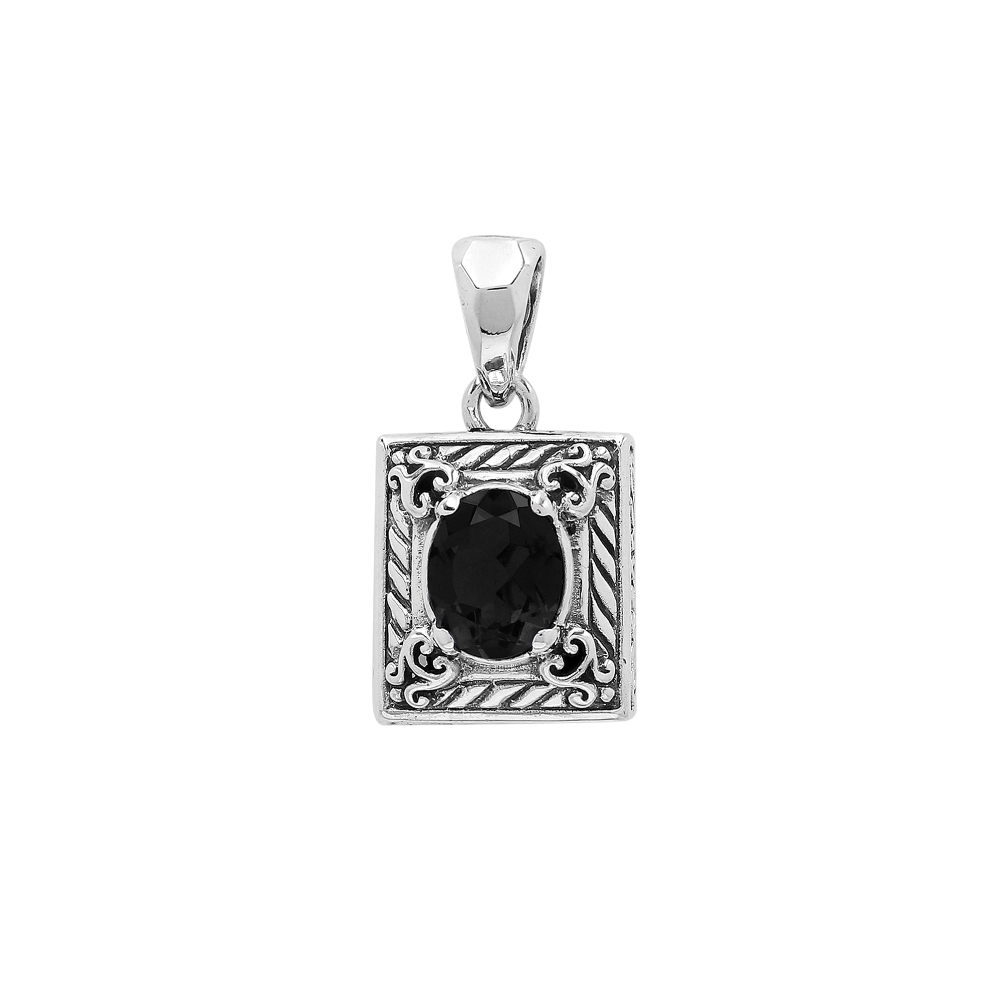 Rectangular sterling silver pendant featuring oval black onyx quartz centerpiece with swirl engravings and polished Balinese silver detailing.