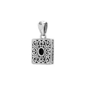 Rectangular sterling silver pendant featuring oval black onyx quartz centerpiece with swirl engravings and polished Balinese silver detailing.
