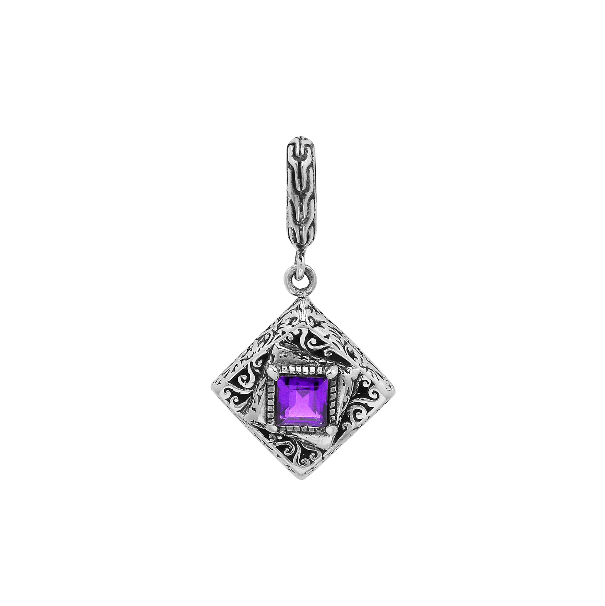 Diamond-shaped sterling silver pendant featuring square amethyst quartz centerpiece, filigree engraving, and smooth polished finish in classic Balinese design.