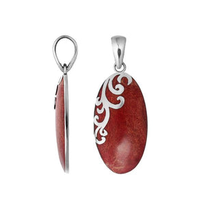 Sterling silver oval pendant featuring Red Coral with polished swirl embellishment handcrafted in Bali.