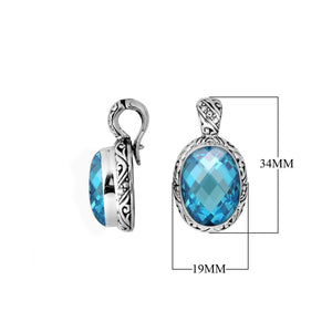 Sterling silver oval pendant with faceted Blue Topaz Quartz and Balinese detailing.