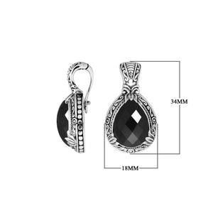Sterling silver pendant showcasing a faceted Black Onyx teardrop set in a carved Balinese frame with a glossy polished finish.