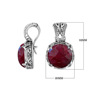 Sterling silver cushion pendant featuring faceted Ruby Quartz set in a Balinese engraved decorative frame.