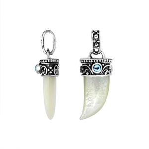Sterling silver Shell tusk pendant with Blue Topaz Quartz and detailed Balinese oxidized silverwork.