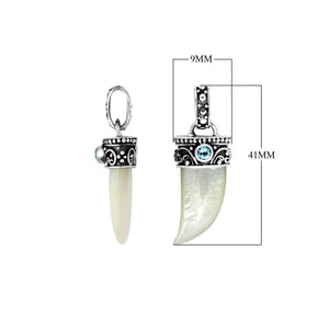 Sterling silver Shell tusk pendant with Blue Topaz Quartz and detailed Balinese oxidized silverwork.