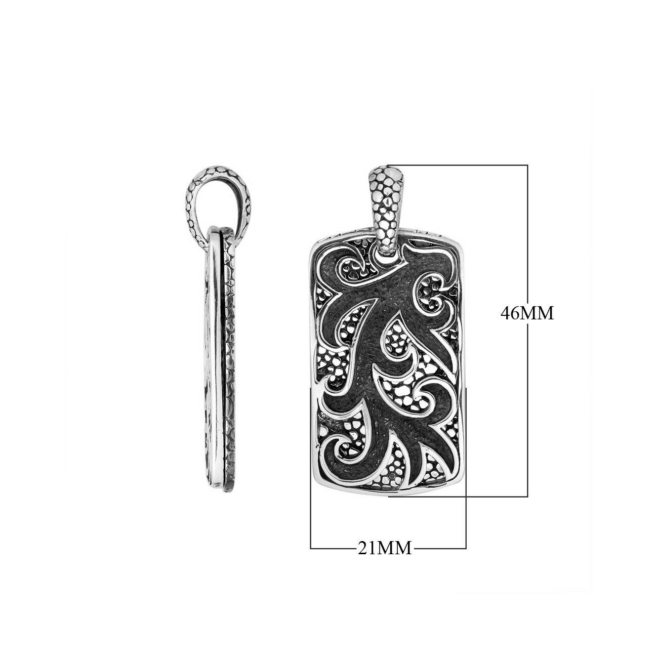 Wholesale sterling silver rectangle pendant with carved swirl pattern.
