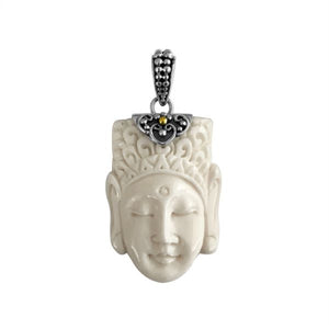 Wholesale sterling silver carved bone face pendant with ornate detailing.