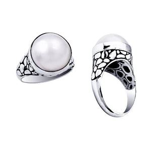 Wholesale sterling silver ring with luminous white Mabe Pearl and pebble-pattern design – handcrafted artisan jewelry for bulk resellers.