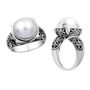 Wholesale sterling silver Bali ring with white Mabe Pearl cabochon and handcrafted filigree design – artisan bulk jewelry.