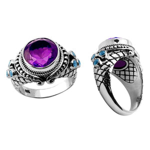 Wholesale sterling silver statement ring with faceted round amethyst quartz center and blue topaz quartz accents, Bali-inspired rope and scroll detailing – handcrafted artisan jewelry for resellers and bulk buyers.