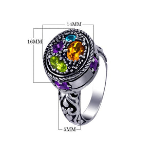 Wholesale sterling silver multi-quartz Bali ring with Amethyst Q., Citrine Q., Blue Topaz Q., and Peridot Q. handcrafted artisan jewelry for bulk orders and retailers.