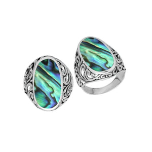 Wholesale sterling silver oval Abalone Shell ring with vibrant iridescent shell and Bali filigree design, handcrafted artisan jewelry for bulk orders.