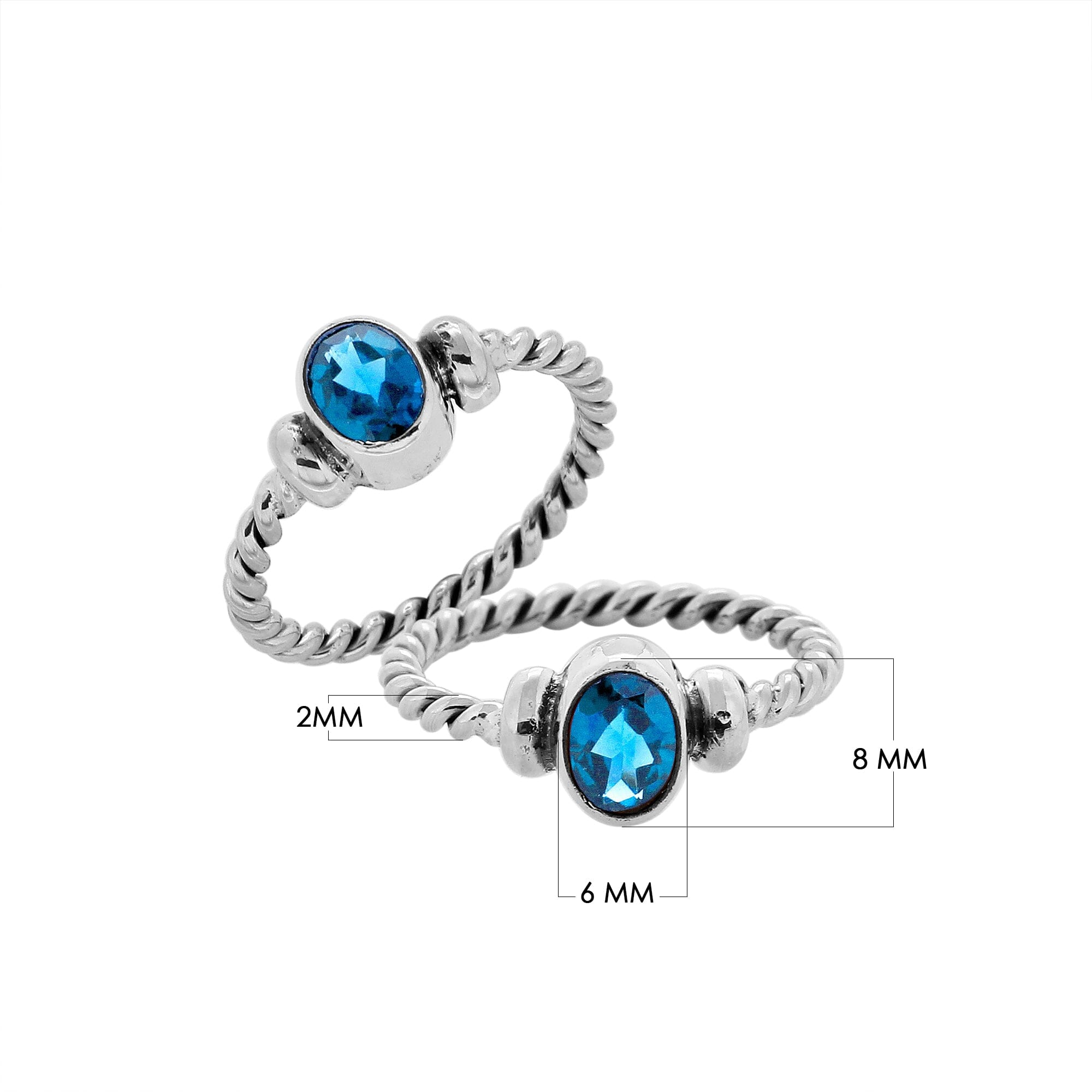 Bulk sterling silver twisted band rings with oval faceted Blue Topaz Quartz, handcrafted 925 silver wholesale jewelry supply.