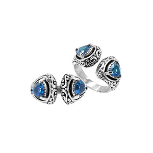 Wholesale sterling silver Bali design ring with trillion-cut Blue Topaz Quartz– handcrafted artisan wholesale jewelry.