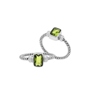 Wholesale sterling silver twisted band ring with rectangular-cut Peridot Quartz, handcrafted artisan jewelry in bulk for retailers and resellers.