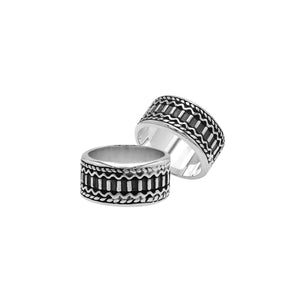 Wholesale sterling silver wide band ring with oxidized Bali-inspired carvings, handcrafted unisex artisan jewelry in bulk for retailers and resellers.
