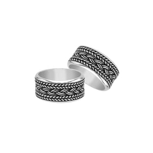 Wholesale sterling silver wide band ring with intricate braided Bali-inspired design and oxidized details, handcrafted unisex artisan jewelry in bulk for retailers and resellers.