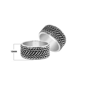 Wholesale sterling silver wide band ring with diagonal braided Bali-inspired design and oxidized details, handcrafted unisex artisan jewelry in bulk for retailers and resellers.